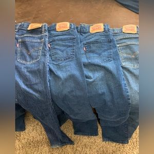 Four pairs of Levi Strauss Denim Jeans. Originally $60 each.